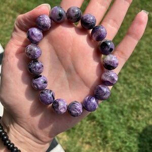 Beautiful crystal purple Russian Charoite beaded bracelet. 12mm